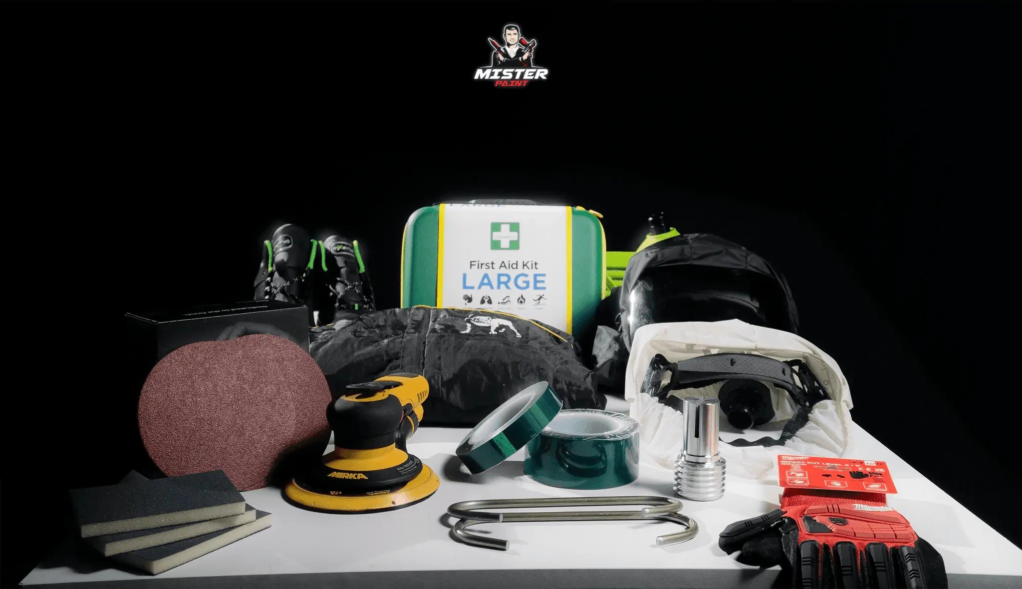 Équipement complet de protection et outils pour spécialiste thermolaquage professionnel sur fond noir