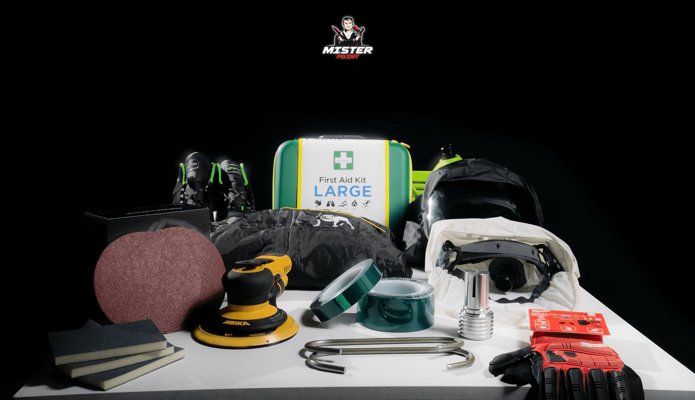 Équipement complet de protection et outils pour spécialiste thermolaquage professionnel sur fond noir