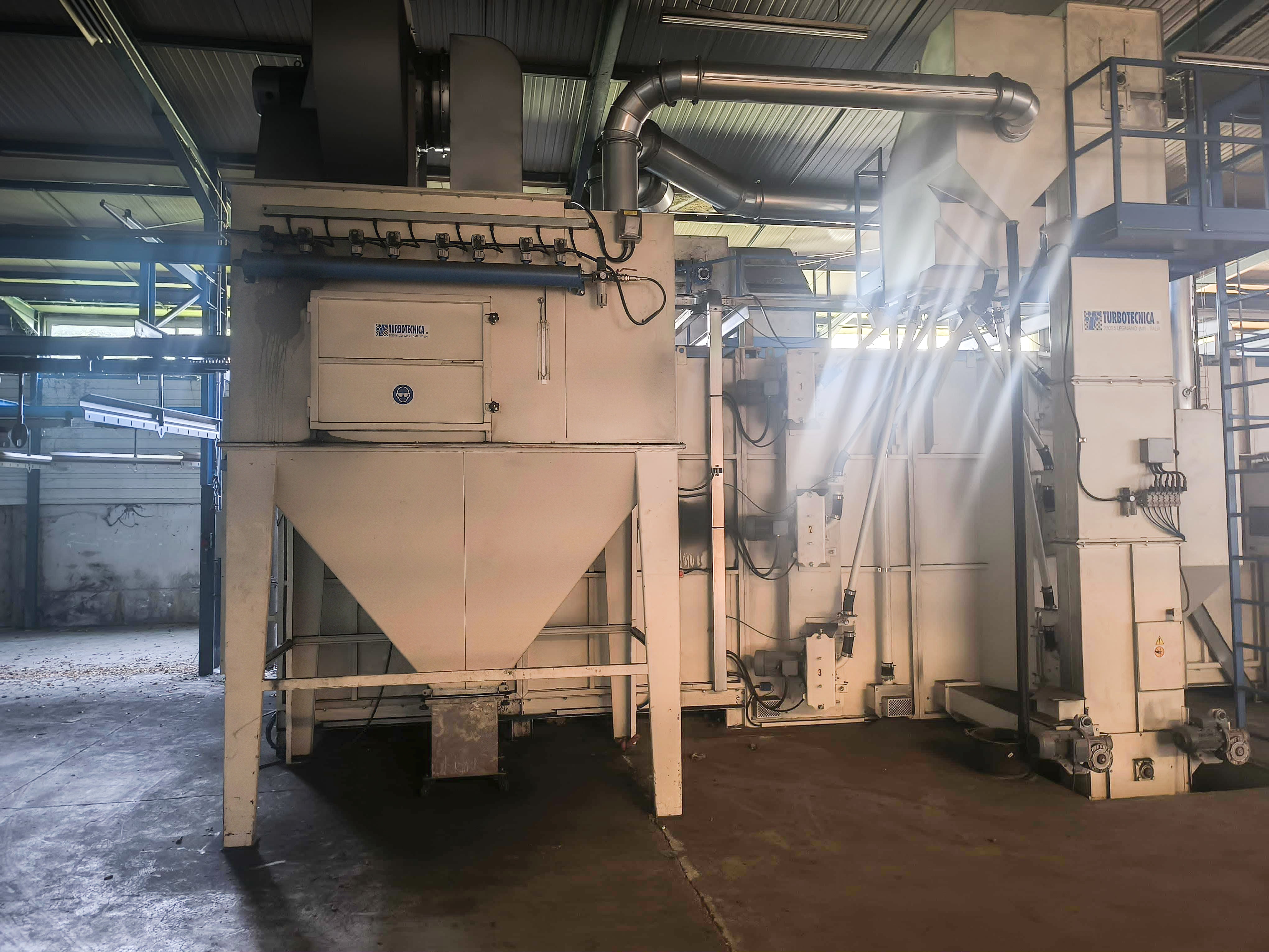 Grenailleuse automatique à charge suspendue traversante TURBOTECHNICA