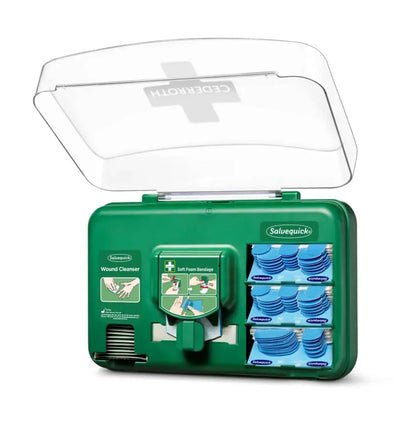 pansements dans un distributeur vert avec nettoyant pour plaies et bandages souples